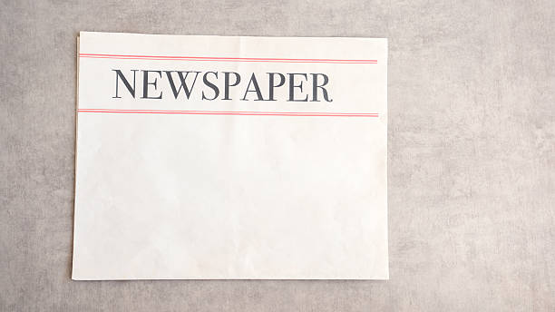 istock Reading newspaper concept on the desk 2220889390