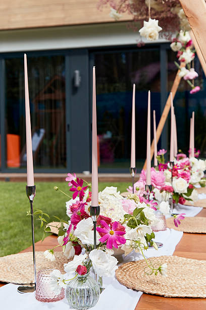 istock Table setting for garden party or wedding. Decorating and special occasion planning concept. 2220889626
