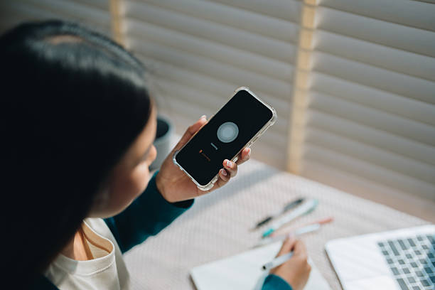 istock Woman using a language app on her phone, enthusiastically learning a new foreign language 2220890495