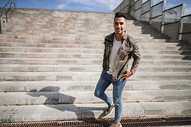cheerful man standing in the street