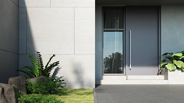 istock Modern white house, Minimal architecture with lawn grass and concrete entrance, 3d rendering of luxury property building 2220893842