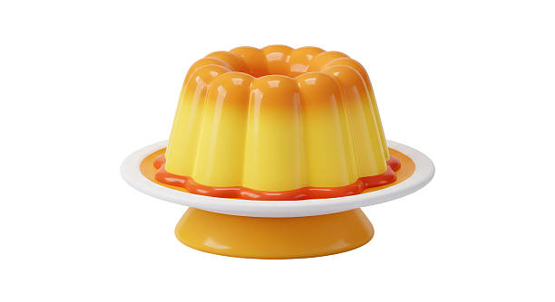 istock Isolated Yellow Flan Dessert on a White Pedestal Plate with Caramel Drizzle 2220897165