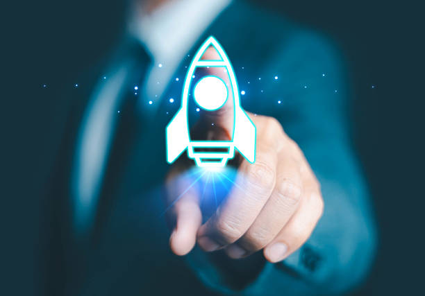 istock Startup business start-up with technology background as a rocket image conveying the idea of ​​launching a well-planned new business. 2220899053