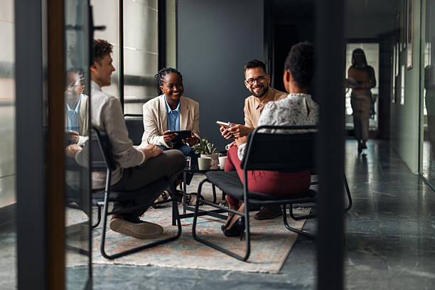 istock Business Team Collaborating in a Bright Office Environment 2220899468
