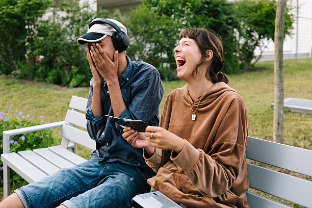 young adults have fun with a retro polaroid camera