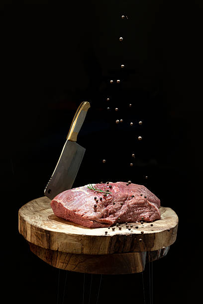 istock Raw fresh veal cut, veal loin, with black pepper 2220903493