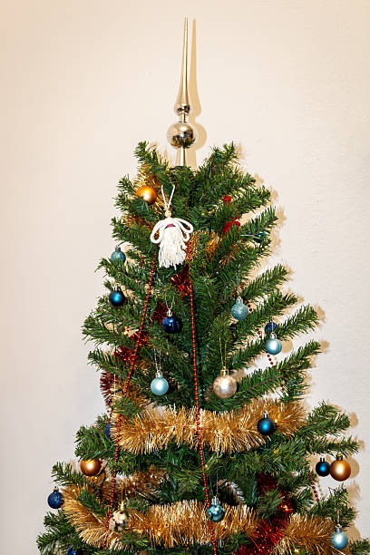 istock Decorated Christmas tree with angel ornament 2220904237