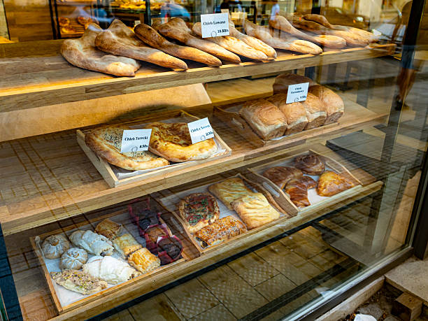 istock Bakery display case with pastries and price tags 2220906120