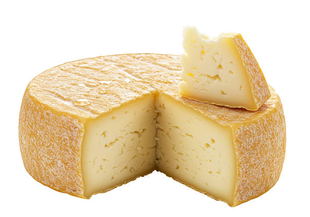 istock Isolated Wedge of Soft Cheese Texture Detail 2220907705
