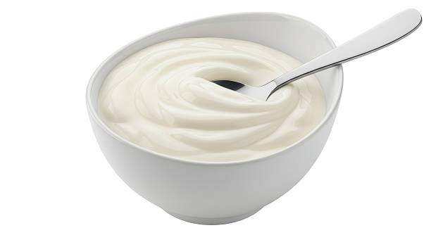 istock Isolated Bowl of Yogurt with Spoon 2220909942