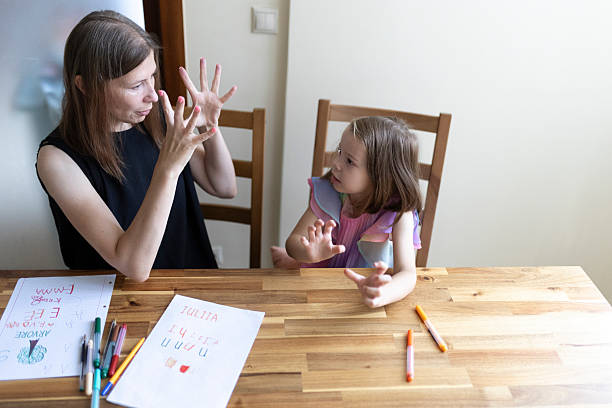 istock Teacher and student counting with fingers during homeschooling session 2220910344