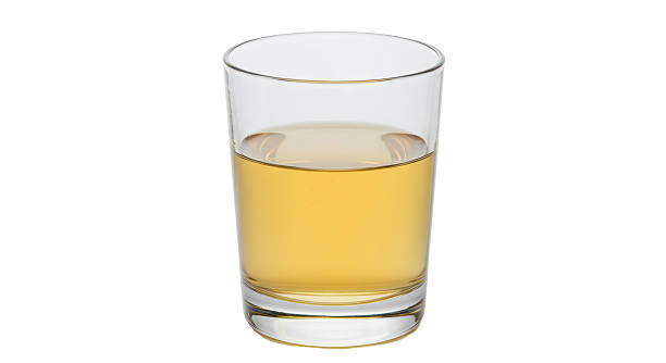 istock Isolated Glass of Apple Juice 2220910795