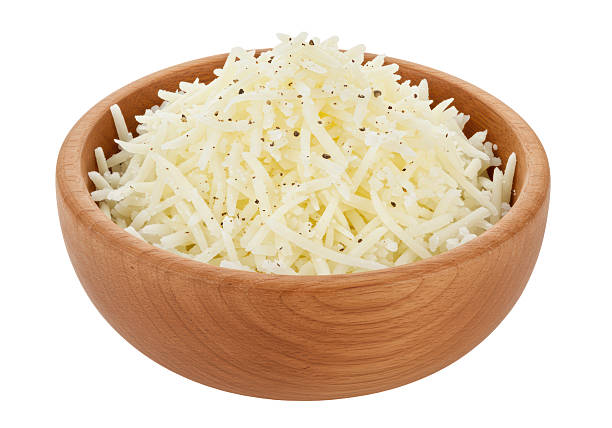istock Isolated Wooden Bowl Filled with Grated Cheese 2220911909