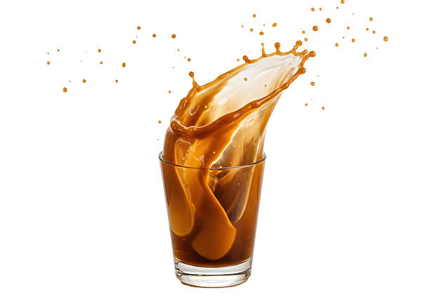 istock Isolated Coffee Splash in Glass Brown Liquid 2220912088