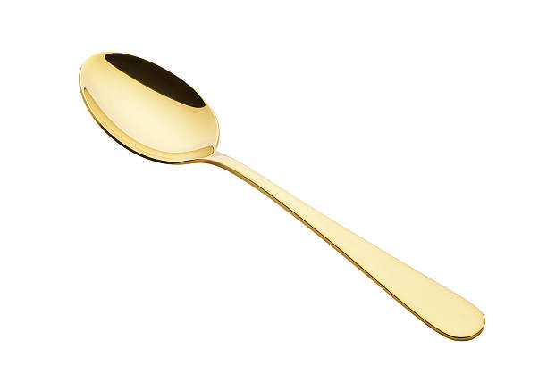 istock Isolated Gleaming Gold Spoon Dining Utensil 2220913241