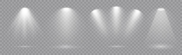 Realistic spotlight beam set on transparent png background and reflection on the floor for stage, studio, or theater light effects. White projector lights.
