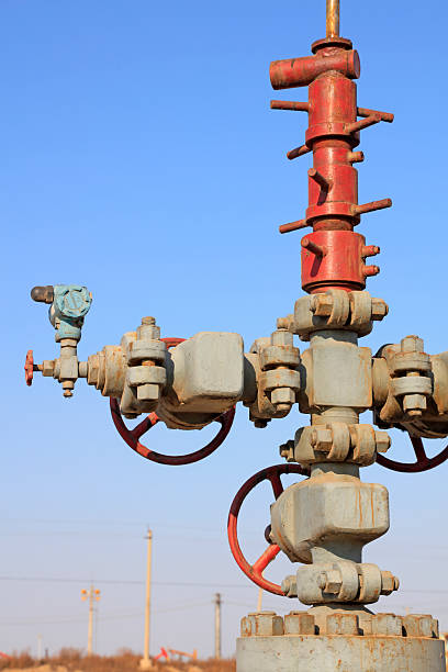 Oil pipeline and equipment under the blue sky, closeup of photo