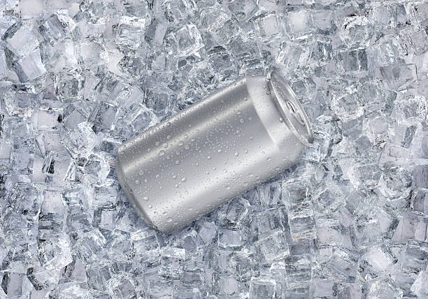 istock Aluminum soda can with water drops on ice cubes. Summer refreshing drink 2220918722