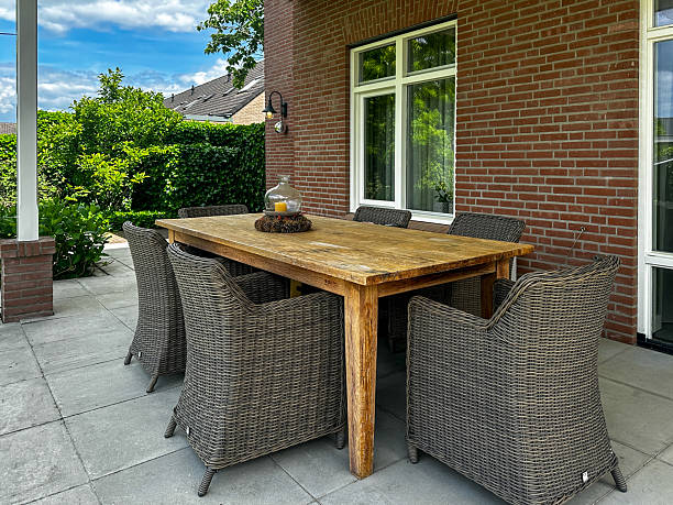istock Terrace with wicker chairs and wooden table 2220919565