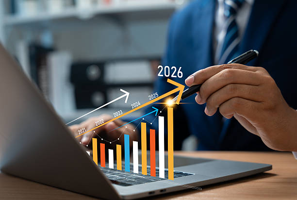istock New Year 2026, Businessman using laptop to create new business plan for 2026. Strategy include setting goal,Development organizational direction,Objective,Target new opportunities for future growth. 2220921755