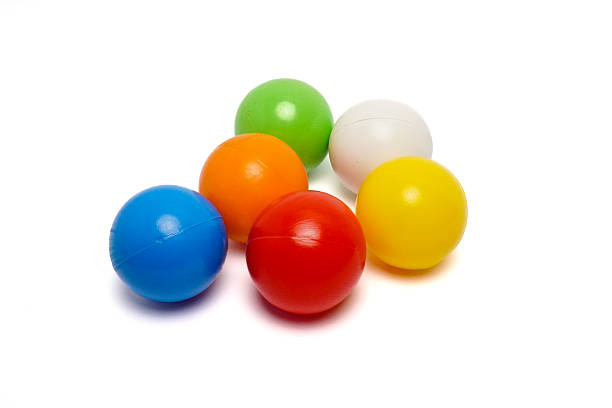 istock Colorful Plastic Balls on White Background 2220922454