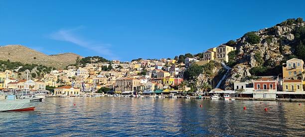 istock Colourful Cascade of Symi Harbor Homes 2220922647