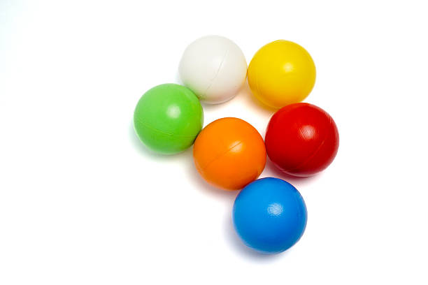 istock Colorful Plastic Balls on White Background 2220922759