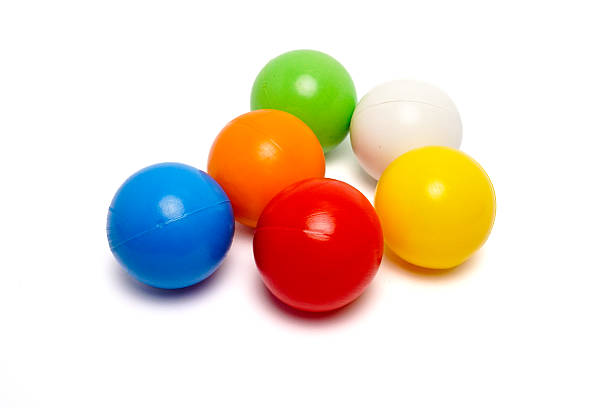 istock Colorful Plastic Balls on White Background 2220922772