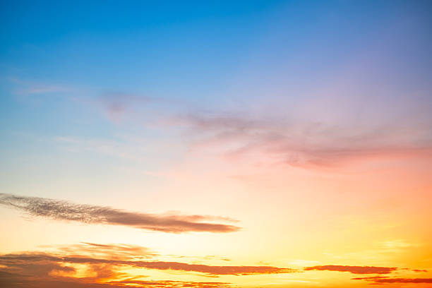 istock Beautiful , luxury soft gradient orange gold clouds and sunlight on the blue sky perfect for the background, take in evening,Twilight, Large size, high definition landscape photo 2220925208