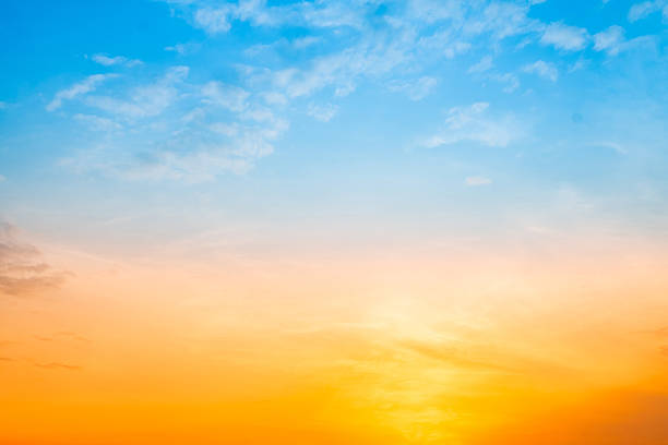 istock Beautiful , luxury soft gradient orange gold clouds and sunlight on the blue sky perfect for the background, take in evening,Twilight, Large size, high definition landscape photo 2220925314