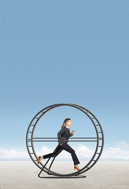 istock Businesswoman Running In Circles On A Treadmill 2220932168