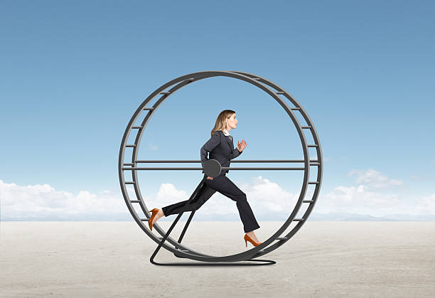 istock Businesswoman Running In Circles On A Treadmill 2220932176