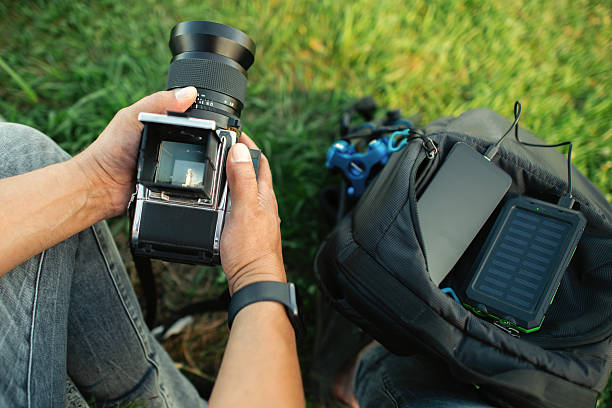 Man making photos with medium format film camera
