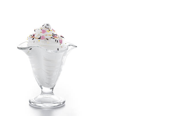 Whipped Cream Delight with Sprinkles on white background