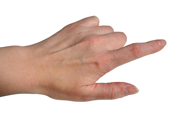 istock A female pointing hand isolated on a white background. A woman's hand pointing with a finger close-up. 2220938941