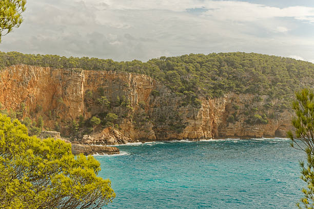 The coastal path between Bandol and Saint-Cyr-sur-Mer in the Var department, France, provides very diverse views of the mediterranean coastline of that part of the Côte d'Azur.