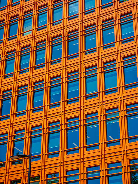 istock Abstract view of orange building exterior 2220942409