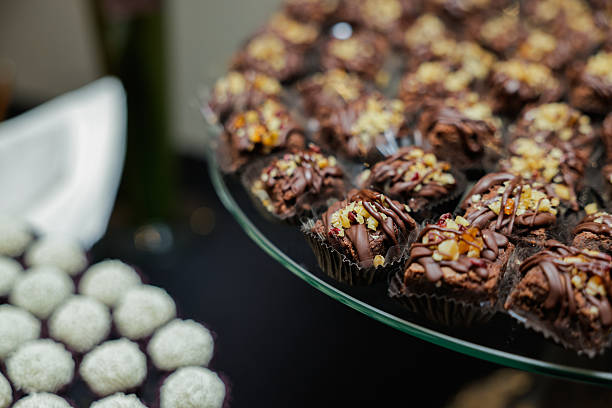 istock Party sweets spread on the tray, brigadeiros, brownie 2220944131