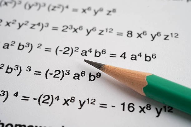 Pencil on mathematic formula exercise test paper in education school.