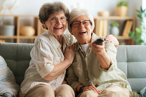 istock Senior women watching TV 2220944496