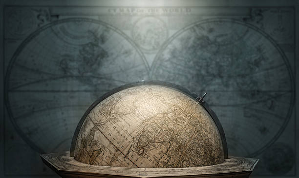 istock Old geographical globe on map background. Science, education, travel, vintage background. History and geography team. 2220944939