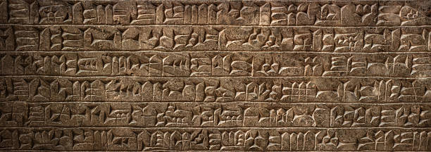 istock Ancient cuneiform Sumerian text. Historical background on the theme of civilizations of Assyria, Mesopotamia, Babylon, interfluve, Sumerian. Ancient archaeological background. 2220944940