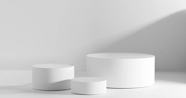 istock 3D render, Round podium white pedestals under soft lighting, Creating minimalist background. Showcasing beauty, skincare, tech, or fashion products in e-commerce, ads, and branding visuals. 2220949378