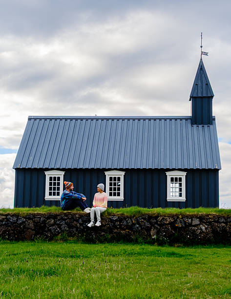 istock Exploring Icelandic architecture near a charming blue church on a cloudy day 2220952956