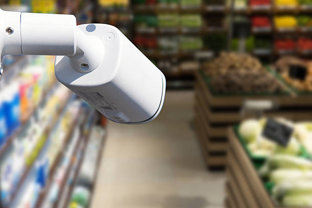 istock CCTV camera system security in shopping mall supermarket blur background.,Abstract background with Blurred people and shopping center. 2220953154
