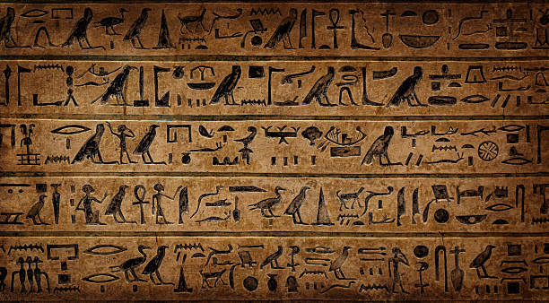 istock Old Egyptian hieroglyphs on an ancient background. Wide historical background. Ancient Egyptian hieroglyphs as a symbol of the history of the Earth. 2220958141