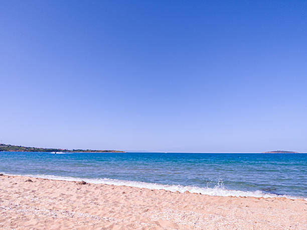 istock Beach, sea, empty sky and island in the distance 2220959967