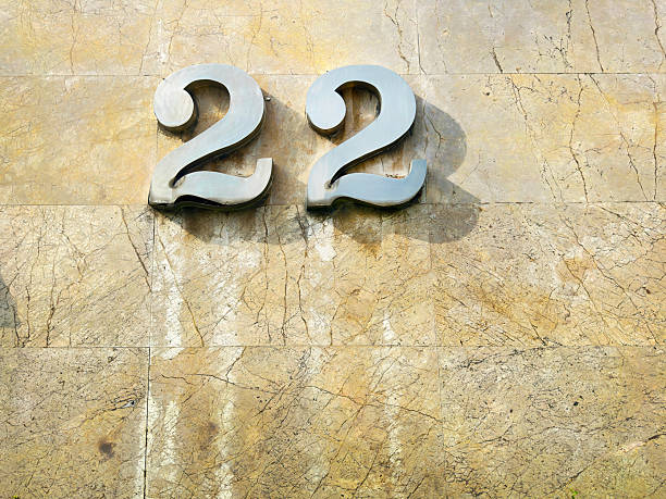 Close up number 22 on concrete wall
