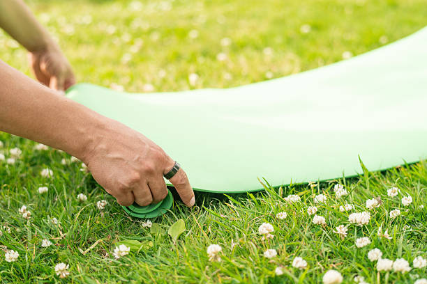Man practicing yoga outdoors