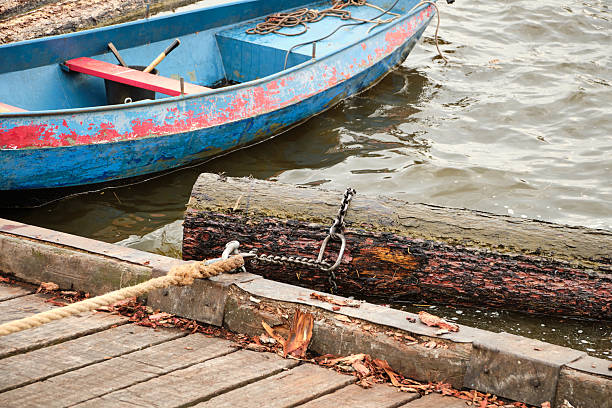 Pellestrina - Venice, Italy - October 25, 2025. Old fishing boat  in Venetian Dockyard.